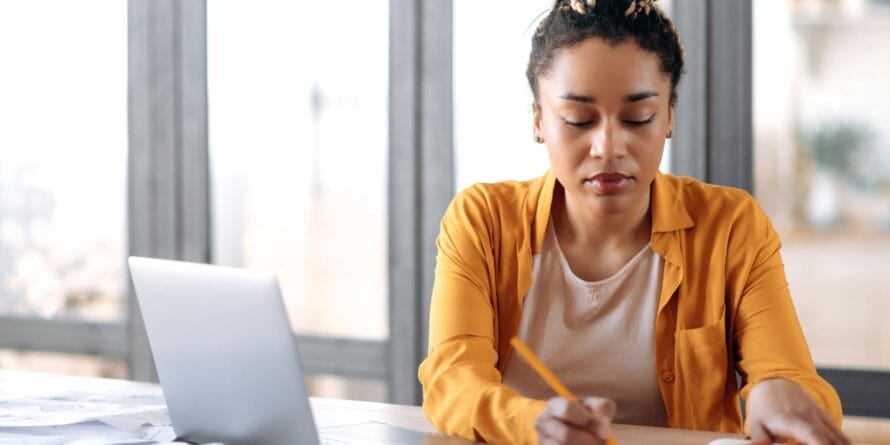 Woman studying - NCEES PE Exa Pass Rate with insights from Petro Publications.