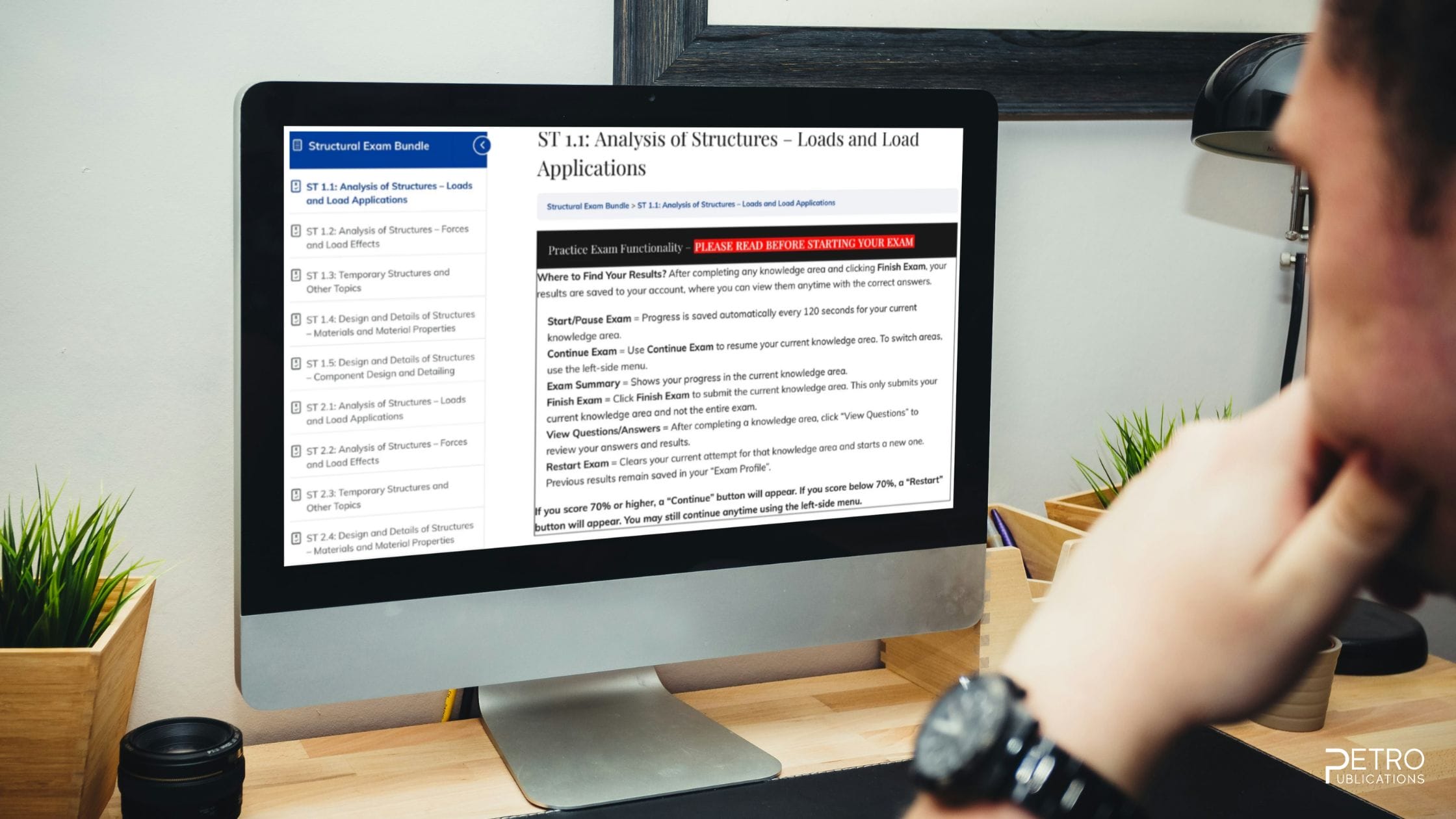 Man looking at an Petro Publications practice exam.