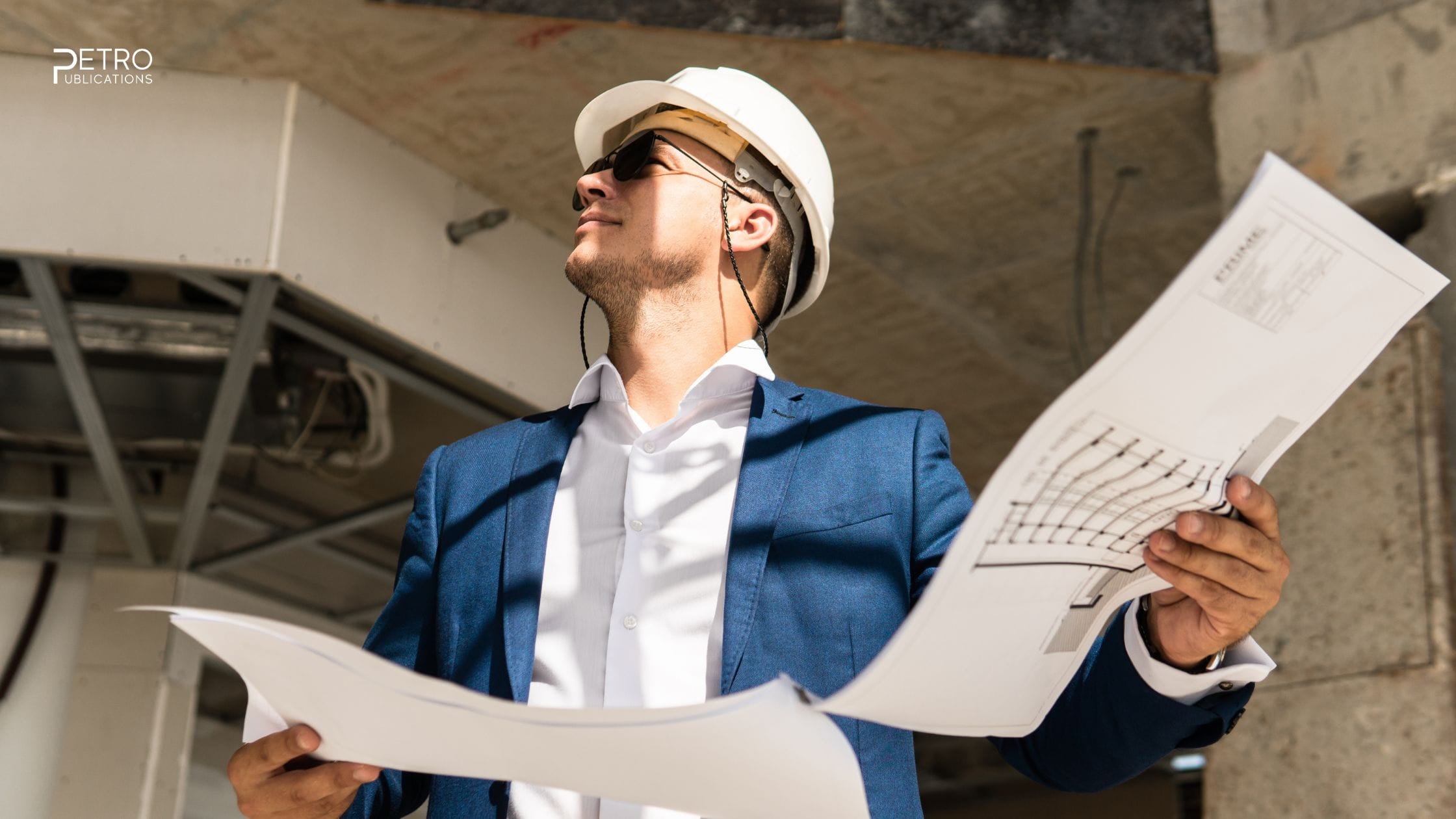 Engineer at a construction site with plans - what are the best PE exam preparation materials = insights from Petro Publications.